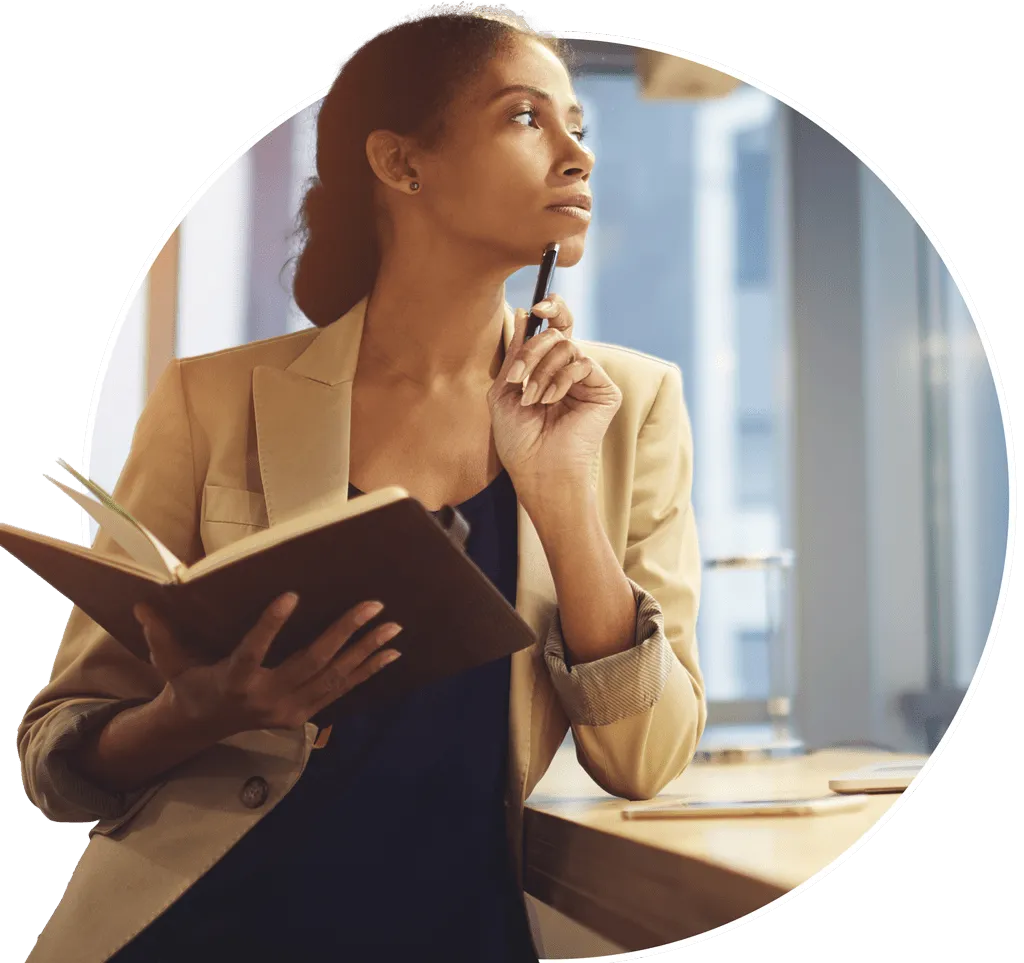 a woman in a corporate attire thinking