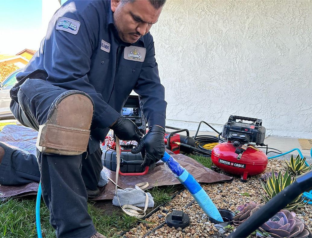 plumber installing new pipe