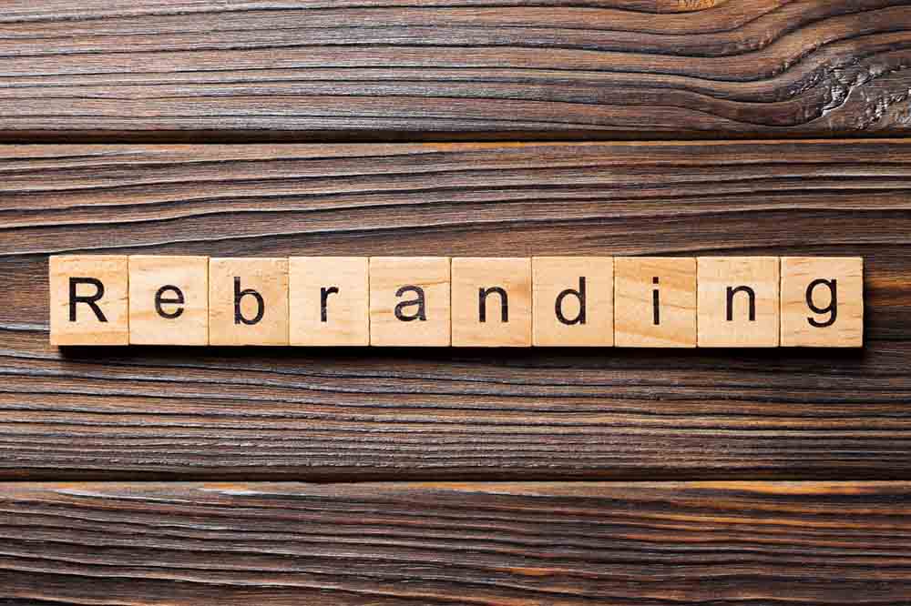 “rebranding” spelled in alphabet blocks “rebranding” spelled in alphabet blocks