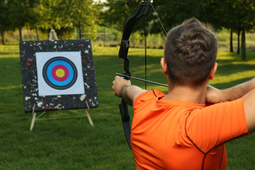 archer shooting a target archer shooting a target