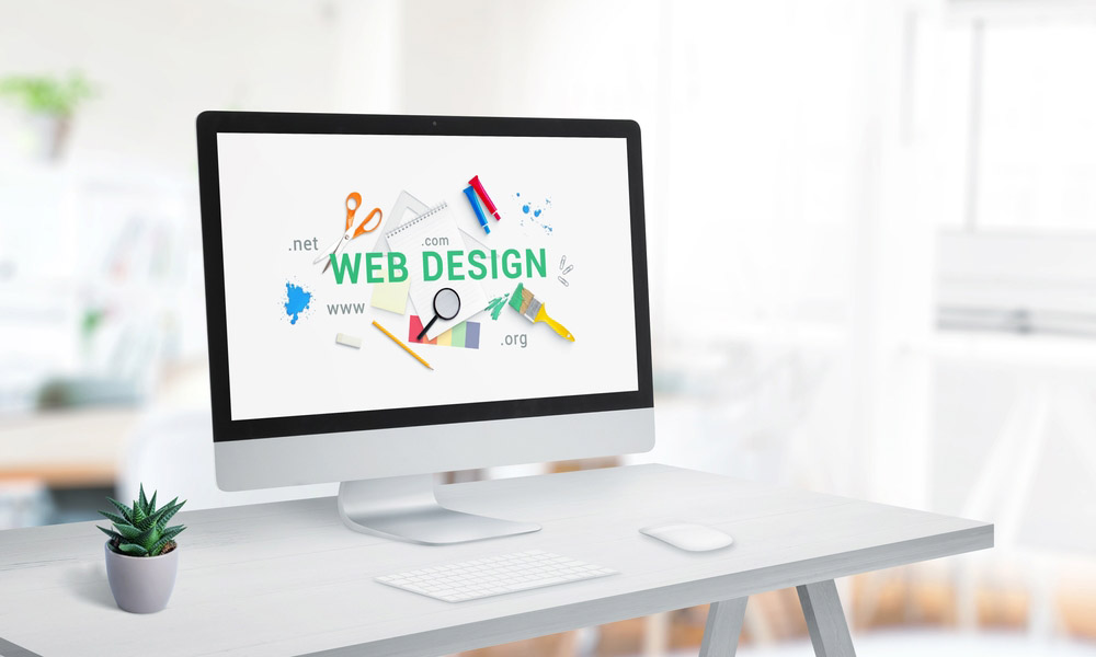 “web design” text prominently featured on a computer monitor “web design” text prominently featured on a computer monitor